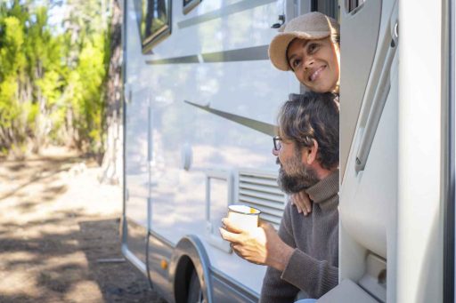 two adults enjoying rv trip